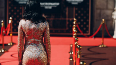 Woman in a luxurious dress on a red carpet