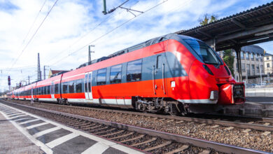 train passes a train station