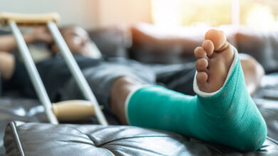 Bone fracture foot and leg on male patient with splint cast and