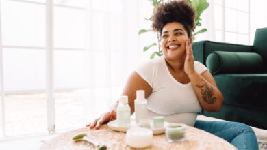 Healthy woman smiling after skin care at home