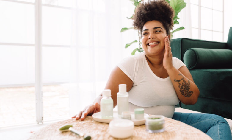 Healthy woman smiling after skin care at home