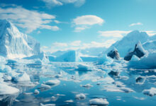 Ice Icebergs And Snow Covered Rocks Against The Sea Created