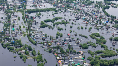 Flooded village in lowland of Great river