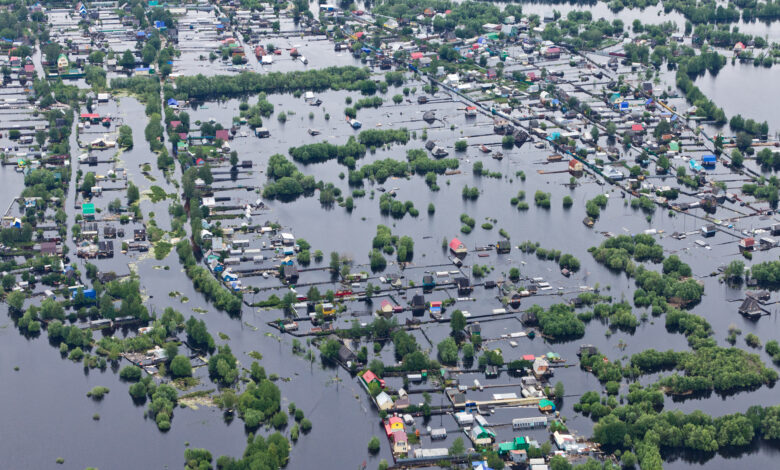 Flooded village in lowland of Great river