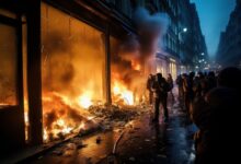 a documentary photo of revolutionary riots and protests. burning building and cars in the city. special force police with equipment catching protesters in the night. Generative AI